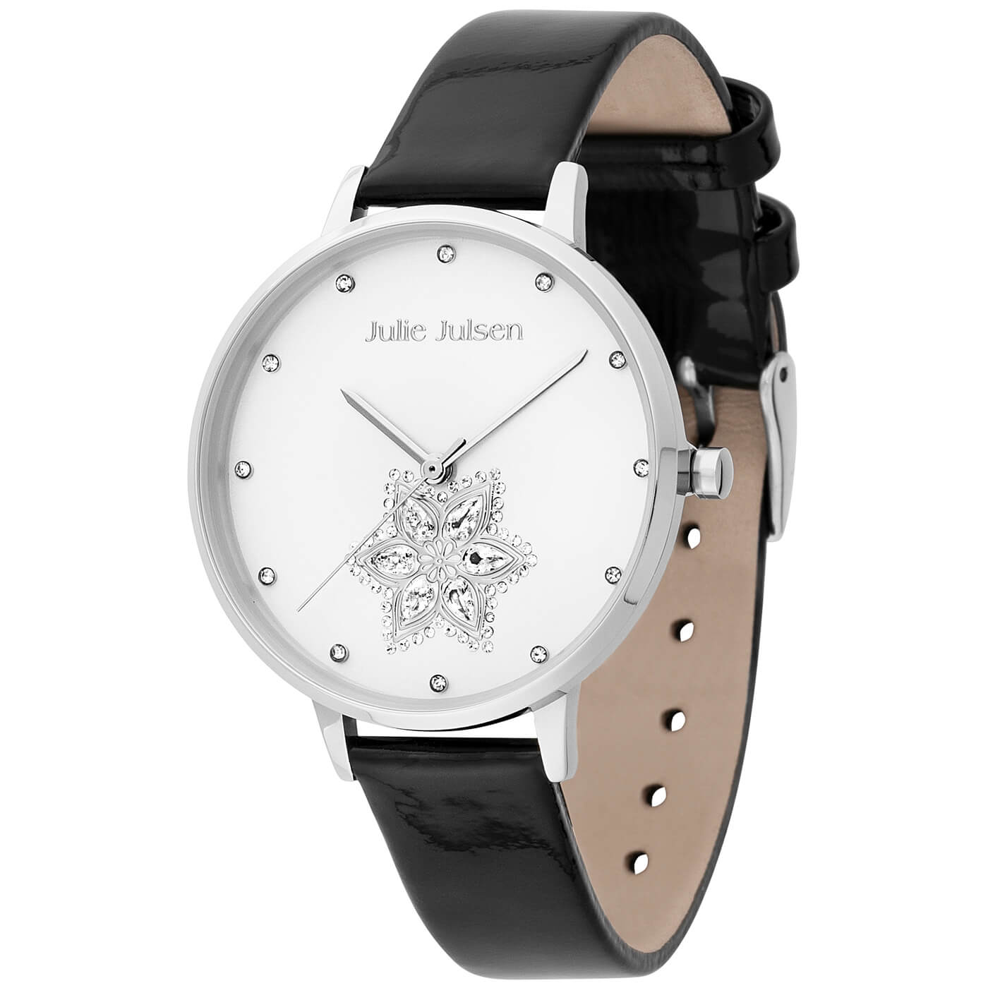 Freigestellte Produktaufnahme einer eleganten Damenarmbanduhr von Julie Julsen mit silberfarbenem Gehäuse, weißem Zifferblatt und schwarzem Lederarmband. Funkelnde Kristallindexe sowie ein dekoratives Blütenmotiv mit Kristallbesatz verleihen der Uhr einen femininen und stilvollen Charakter.