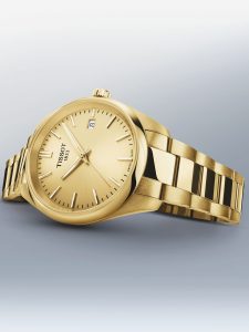 Tissot Herrenuhr mit goldfarbenem Zifferblatt, Datumsanzeige und goldfarbenem Edelstahlgehäuse mit Edelstahlarmband